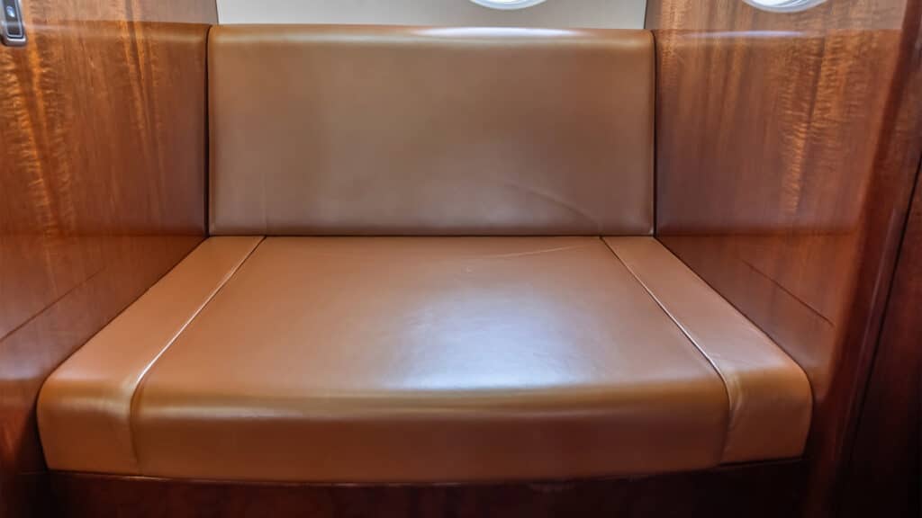 Private jet brown leather lavatory