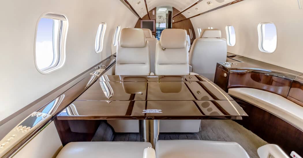 Four place conference group seating in a private jet.