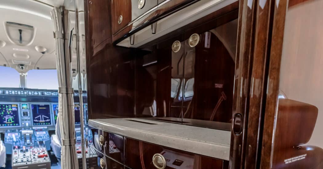 Spacious forward galley on a private charter jet